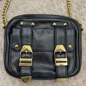 Black and gold Rebecca Minkoff crossbody